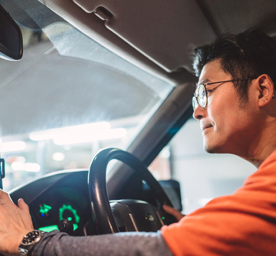 close-up of business person driving a van